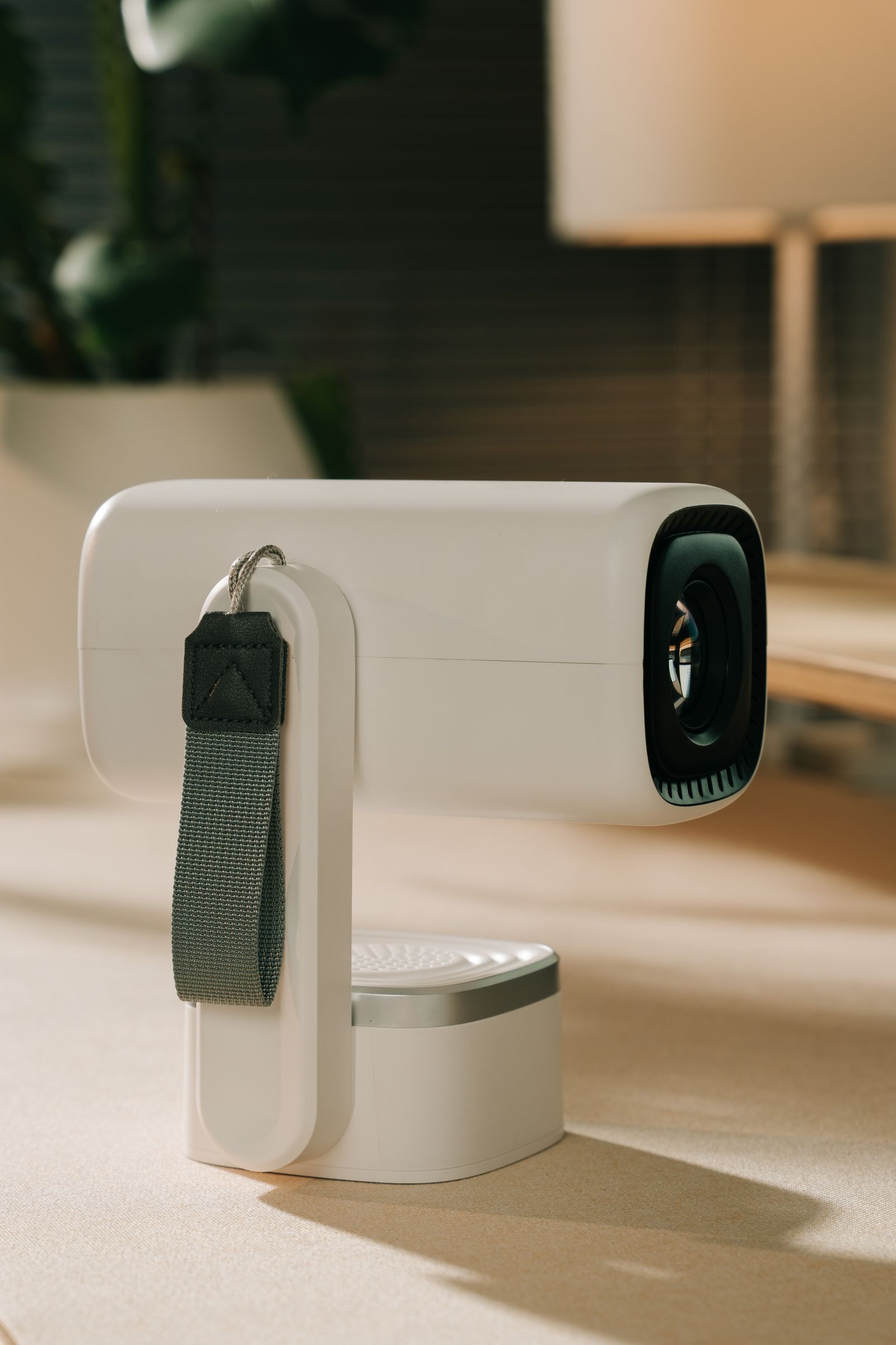 Compact white air purifier standing in a bright modern room