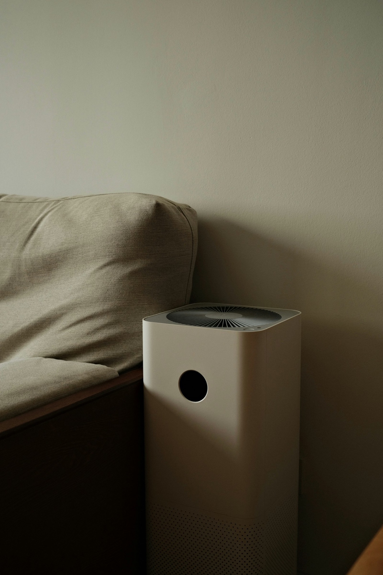 Air purifier operating in a bright living room