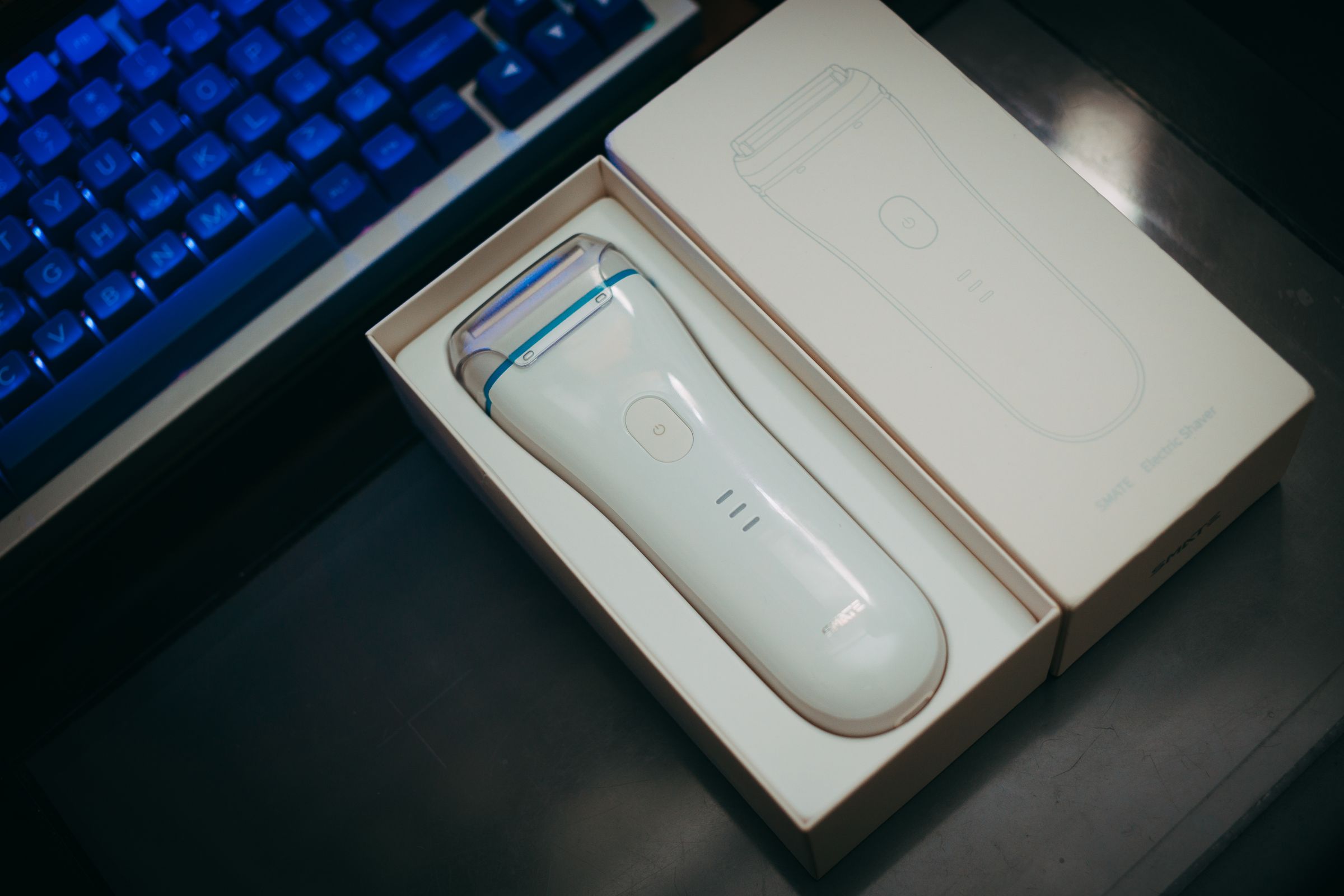 Boxed electric shaver ready to be packed for air travel