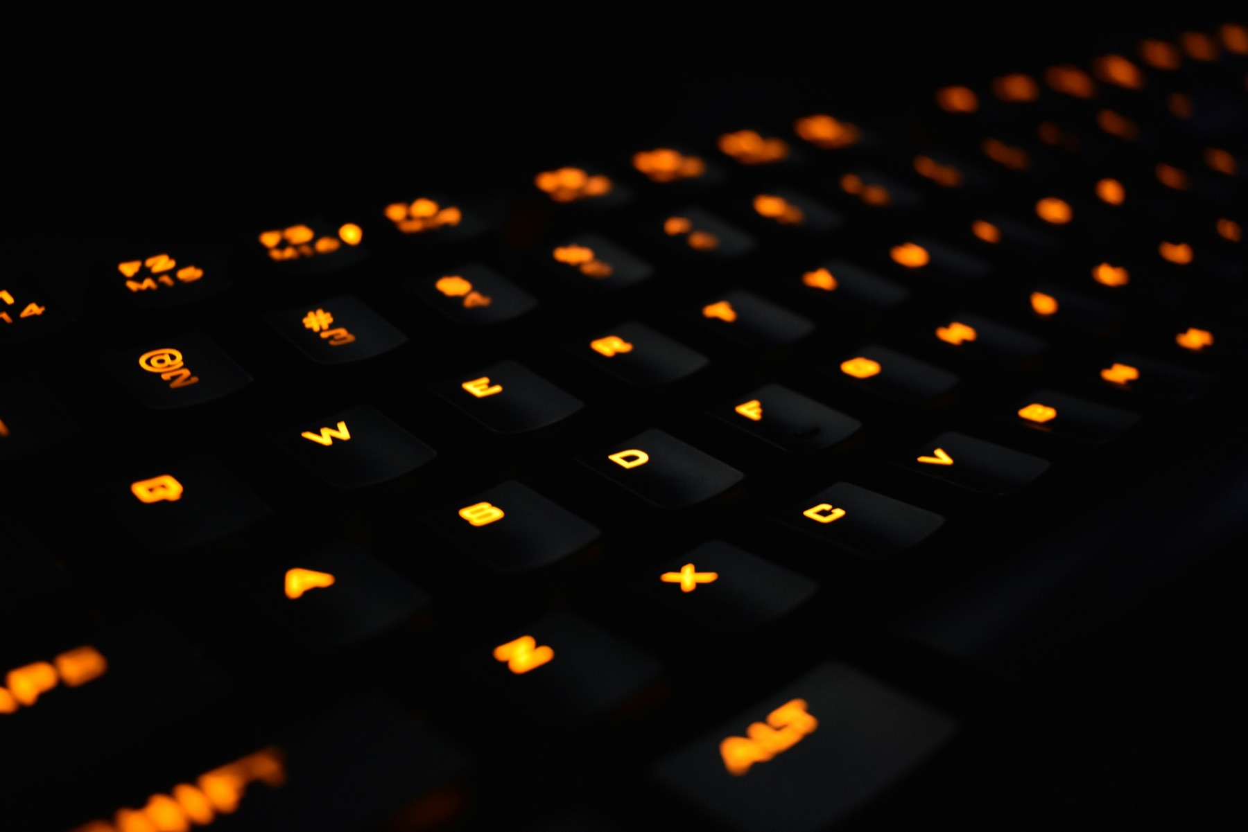 Close-up of a backlit mechanical keyboard